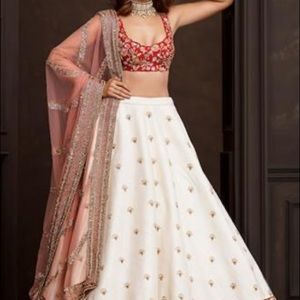 Shyamal Bhumika designer Indian wedding dress with additional red dupatta